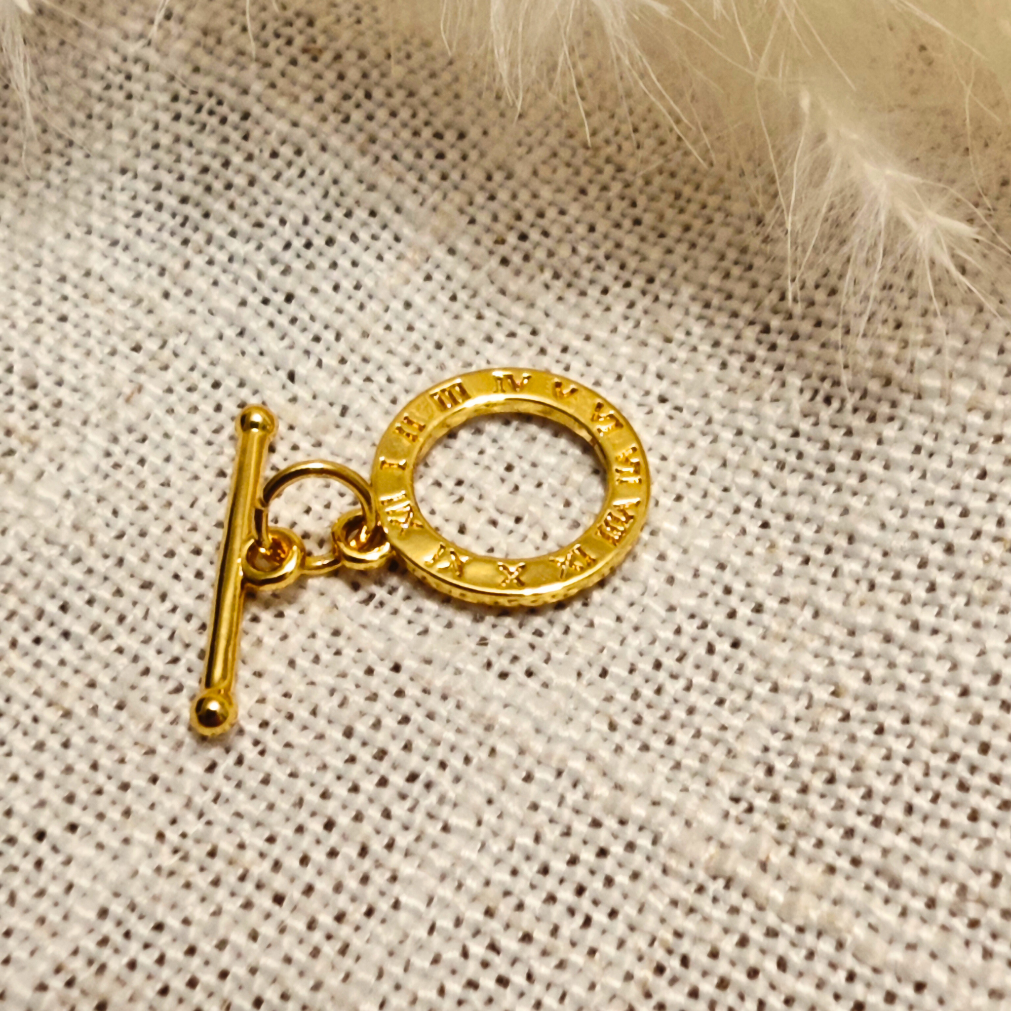 fermoir chiffre romain doré